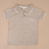 پولوشرت پسرانه پنبه ای یقه دودکمه بنتون سایز بندی 35 تا 45 مناسب 1 تا 4 سال رنگبندی دارد